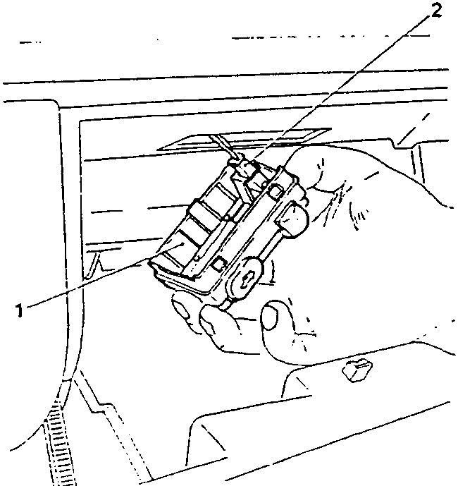 Illustration showing hand removing the light unit from its mounting bracket.