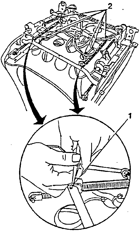 Diagram showing disconnection of sliding device return spring and cutting plastic clamp holding wiring.