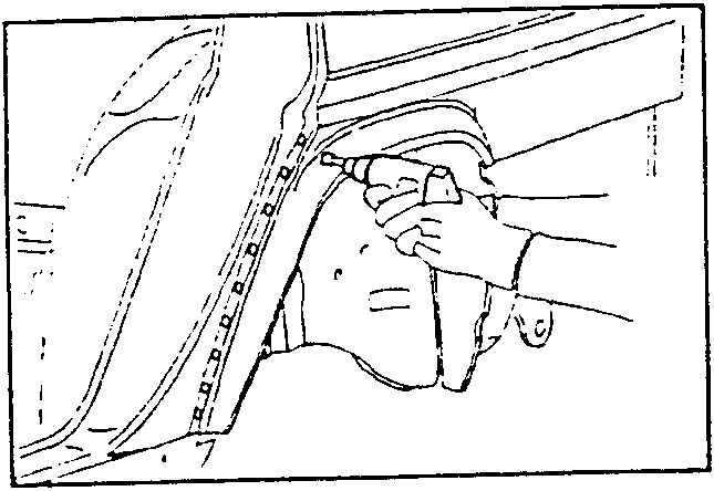 Illustration showing hands using a tool to remove spot welds from a car body panel.