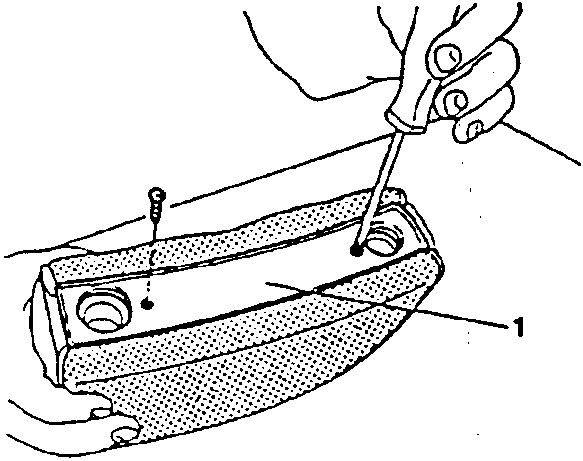 Diagram showing screw removal from headrest moulding