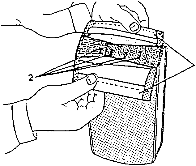 Hands pulling apart the ends of an armrest covering, showing the synthetic material and padding underneath.