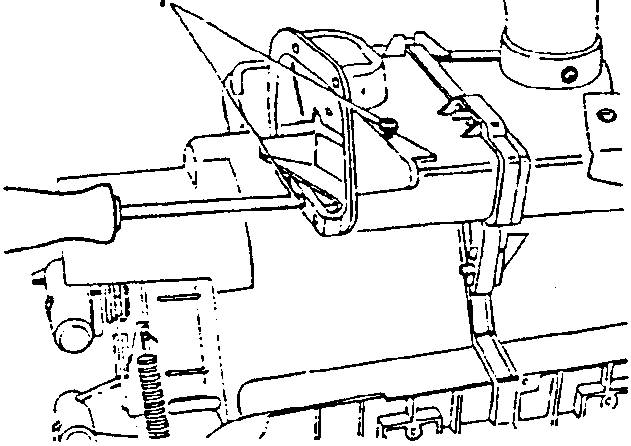 Diagram showing loosening two screws to remove left-hand side outlet