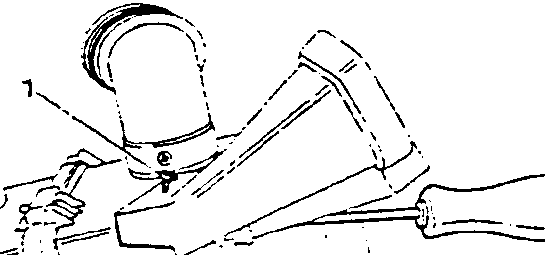 Diagram showing loosening two screws on a right-hand side outlet