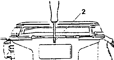 Diagram showing using a screwdriver as a lever to separate casing halves