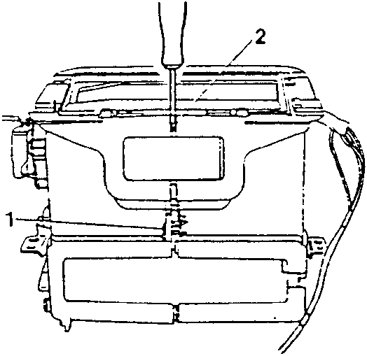 Diagram showing using a screwdriver as a lever to separate two casing halves