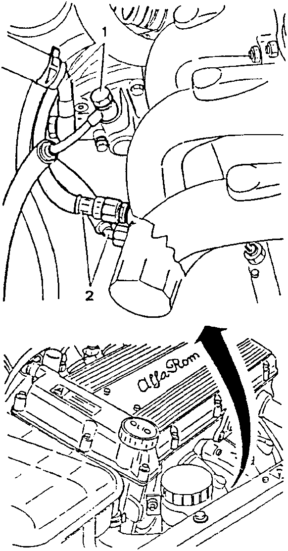 Engine with hoses disconnected and arrow indicating removal direction