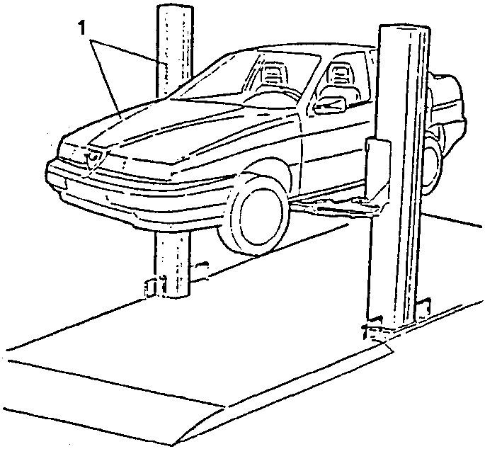 Vehicle raised on a lift with front wheels off the ground