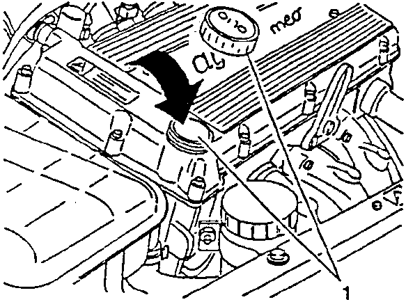Checking engine oil level with dipstick