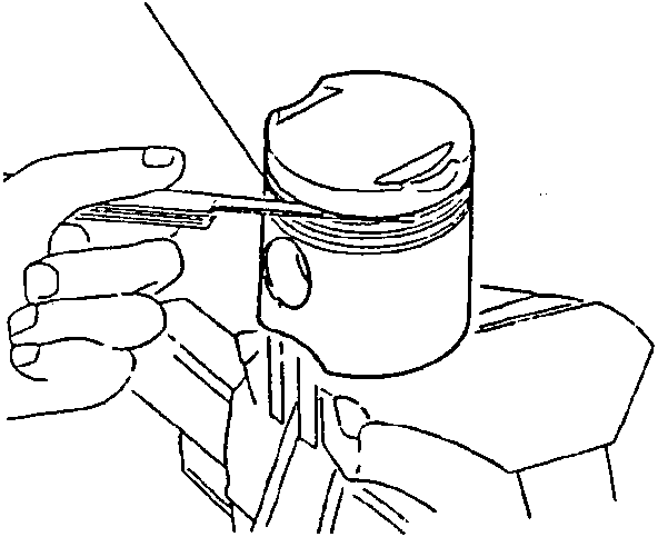Hand inserting piston rings into a cylinder liner, labeled with '1' pointing to the ring set.