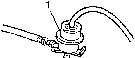Close-up of pressure regulator with vacuum intake hose