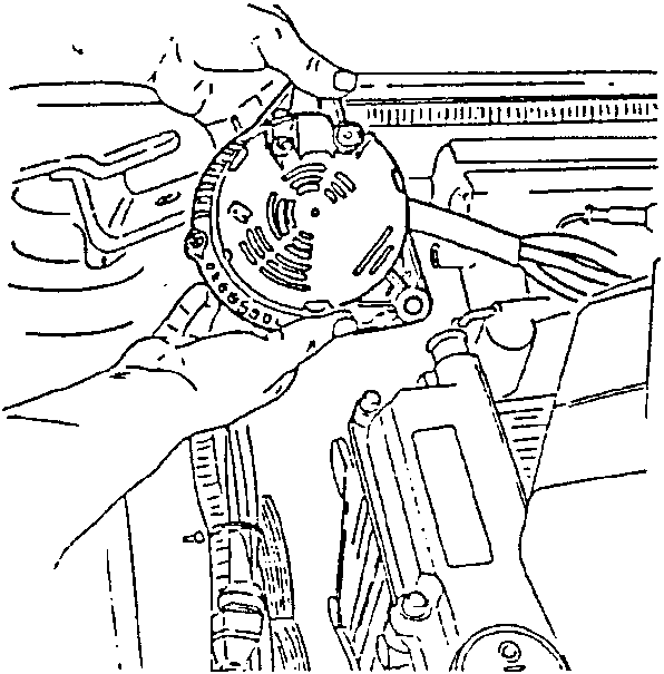 Hand removing alternator with wrench