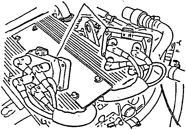 Engine diagram showing ignition coil placed on timing cover