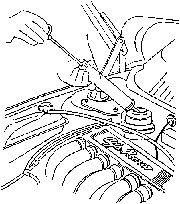 Hand using syringe to empty power steering oil tank