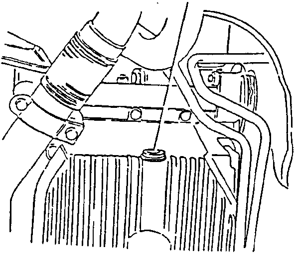 Hand unscrewing oil sump cap