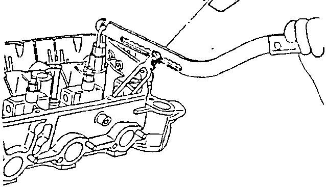 Diagram showing removal of valve cotters with a tool inserted into the valve stem area.