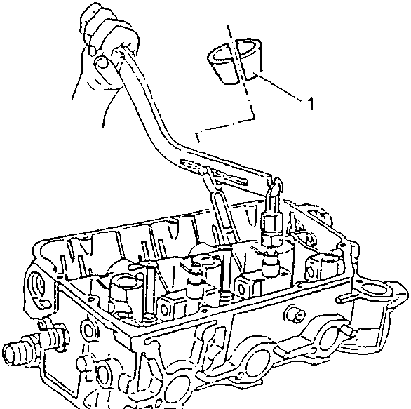 Diagram showing the engine block with valve cotters being removed using a tool.