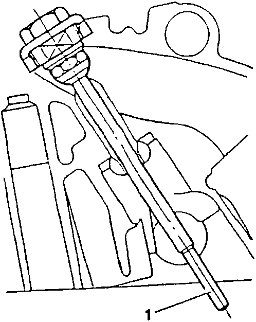 Illustration showing a tool tapping on a valve seat protruding from a cylinder head