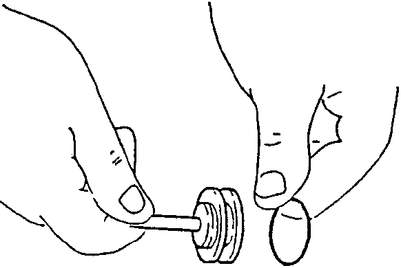 Diagram showing hand removing O-ring from piston