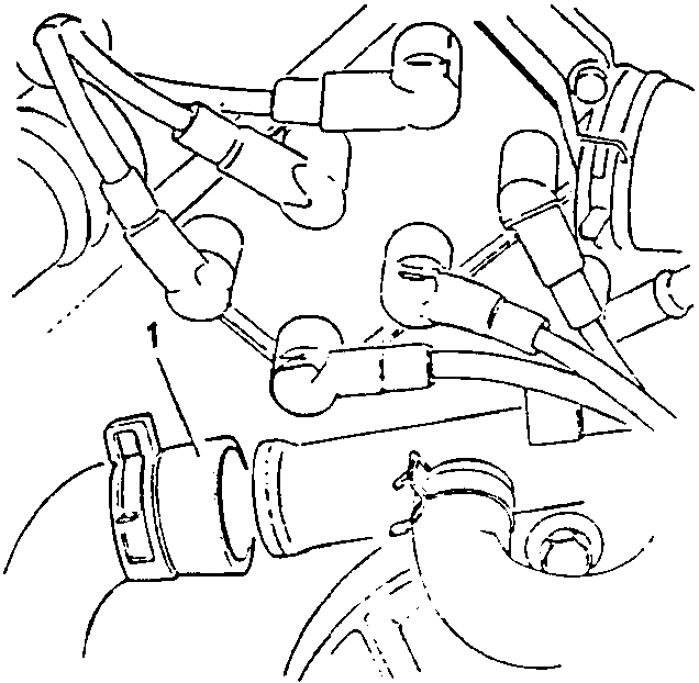 Close-up of engine components with hoses and connectors