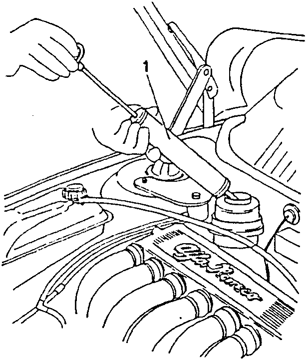 Power steering fluid reservoir being drained with a syringe