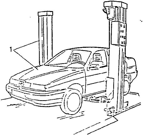 Vehicle on a lift with a mechanic working on it