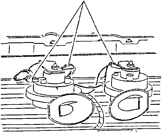Diagram showing two horns with electrical connectors being disconnected.