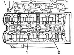 LEFT CYLINDER HEAD – R.R. AND REPLACING GASKET