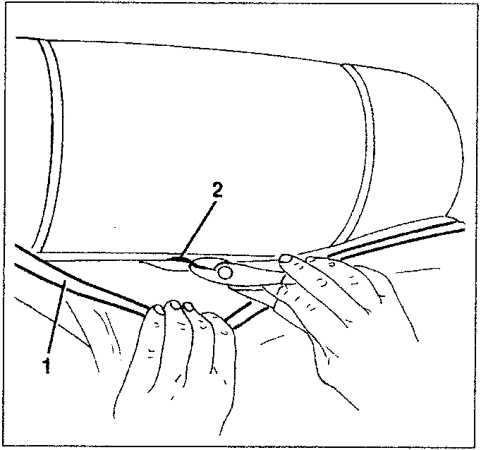 Diagram showing hands using pliers on metal clips