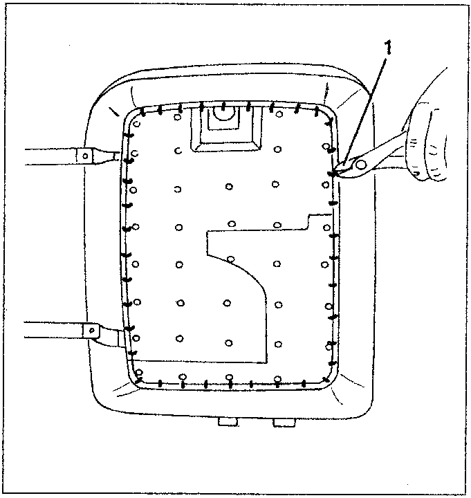 Diagram showing removal of metal clips from cover to padding