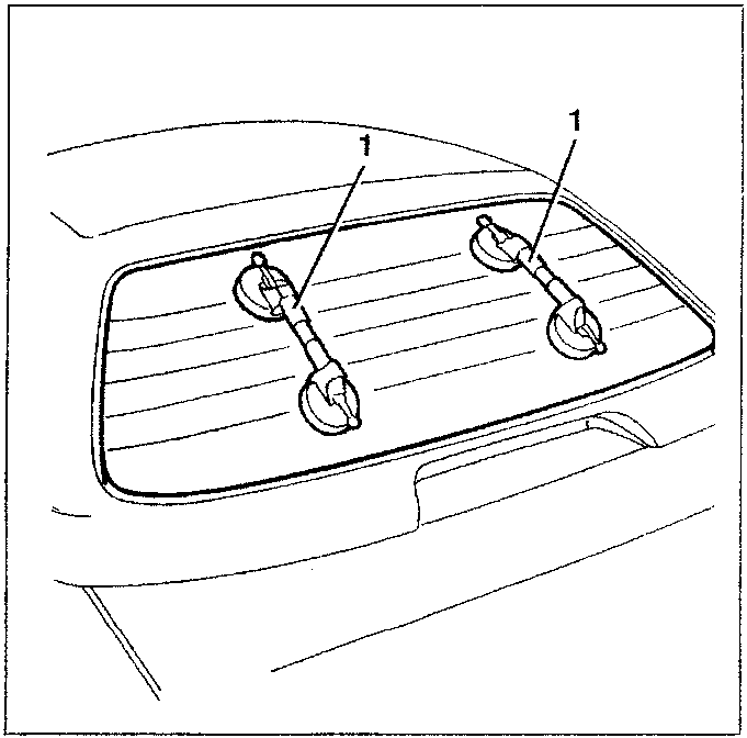 Diagram showing the rearscreen with suction pads attached, labeled 1.
