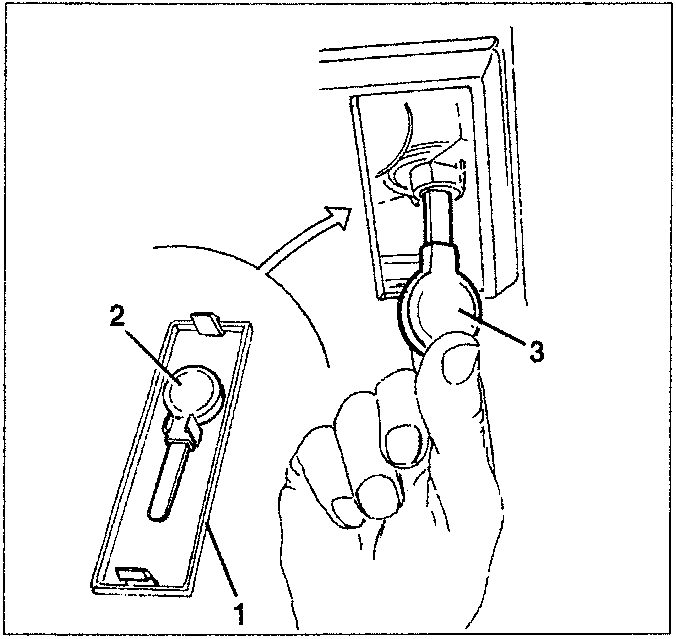 Hand inserting a tool into a mechanism labeled 3, with part 2 being a plate.