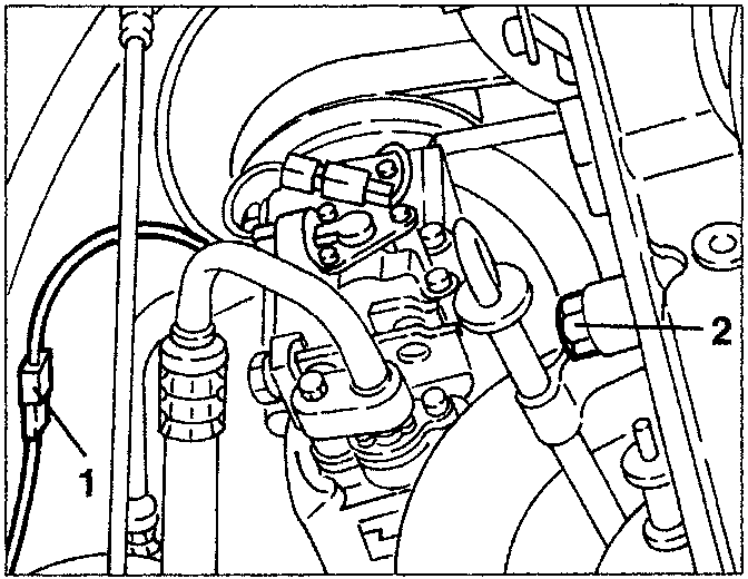 Engine compartment showing electrical connection and dipstick screw