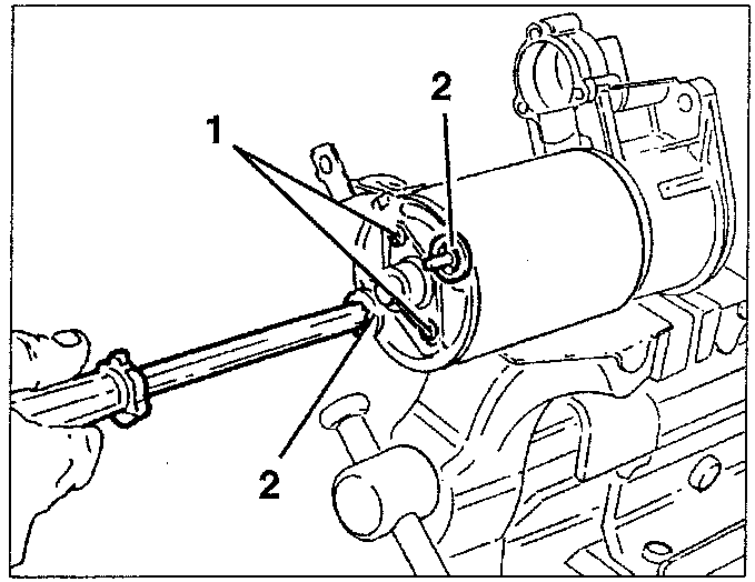 Removing the thru screws from the starter motor. Part 1 is the screw, part 2 is the thru screw.
