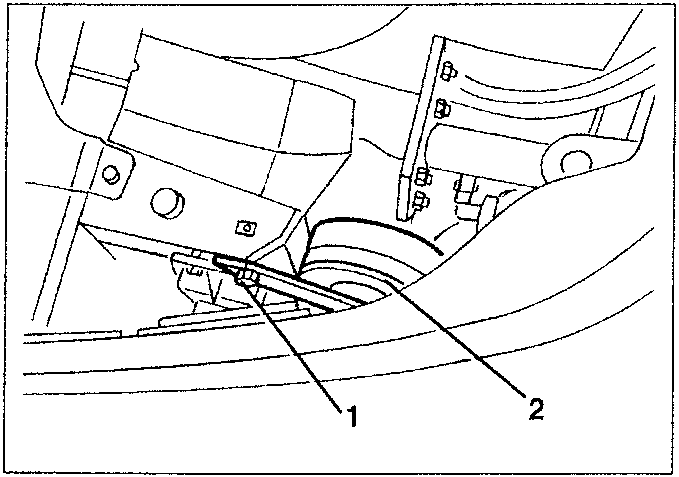 Diagram showing components 1 and 2 in a car's interior near the steering column.