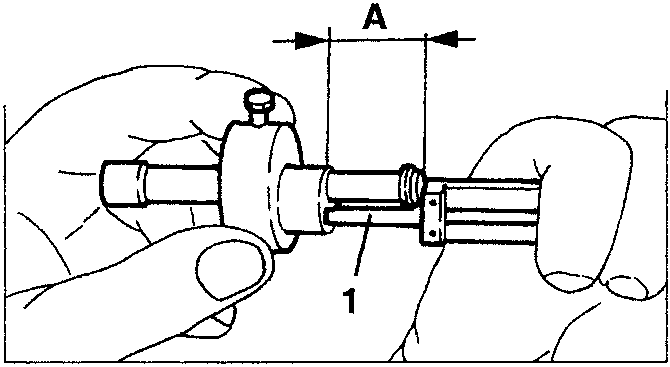 Hand holding a sensor with dimension A marked