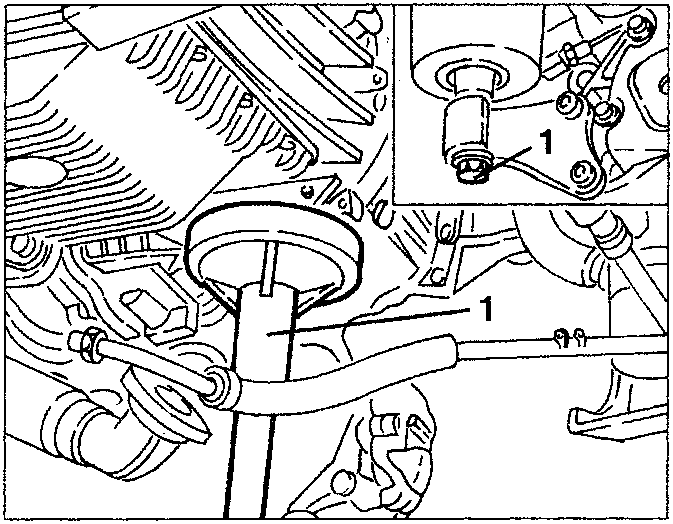 Hydraulic jack under gearbox with screw being loosened