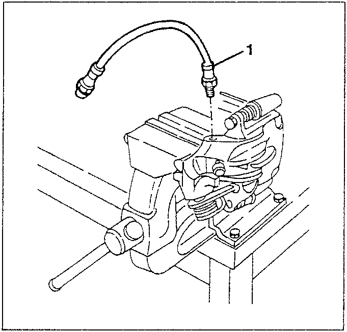 Brake caliper with hose fitting disconnected