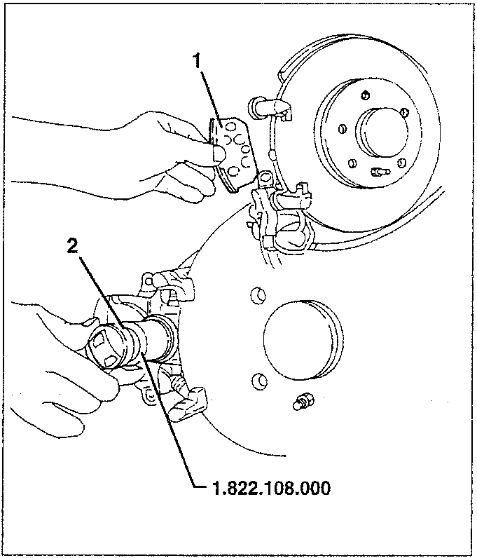 Rear brake caliper with piston being moved back using tool 1.822.108.000