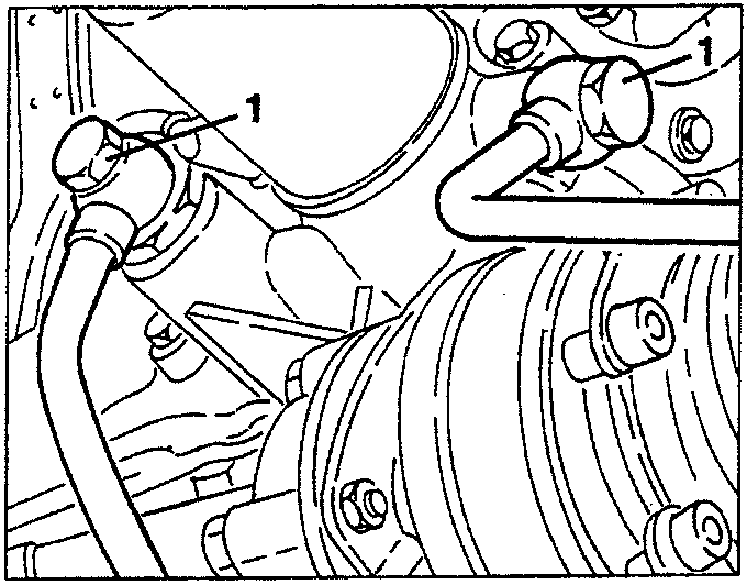 Oil delivery and return pipes near oil filter