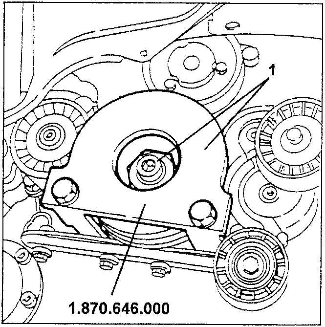 Engine pulley nut being loosened with tool 1.870.646.000