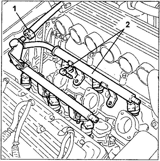 Engine with fuel delivery pipe disconnected and manifold removed