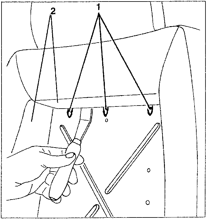 Diagram showing tools used to remove clips from seat back cover with labeled parts 1 and 2