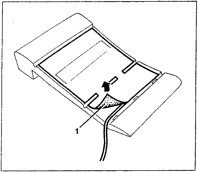 Diagram showing heater pad detachment from upholstery with arrow indicating pull direction.