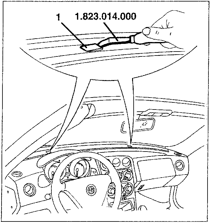 Diagram showing hand using tool 1.823.014.000 to remove dashboard cover