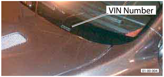 Photo showing the VIN Number stamped on the lower edge of the windscreen