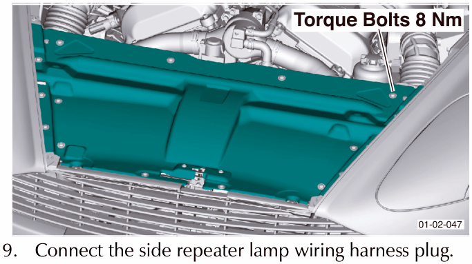 View of the slam panel area with callout indicating torque specification for bolts