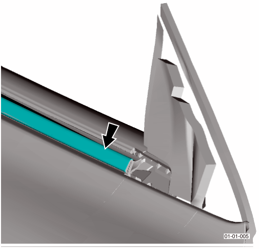 Outer weather seal strip being installed along the top edge of the door trim panel
