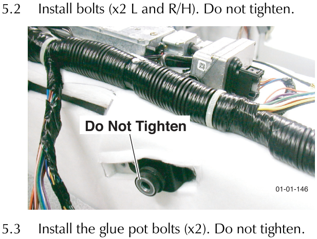 Photo showing bolts in the vehicle structure with a label 'Do Not Tighten' pointing to a bolt.