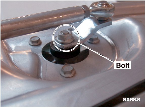 Close-up of a bolt securing the wiper linkage to the wiper motor assembly