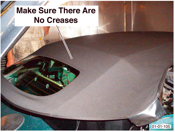 View of the installed convertible roof hood with text overlay 'Make Sure There Are No Creases'